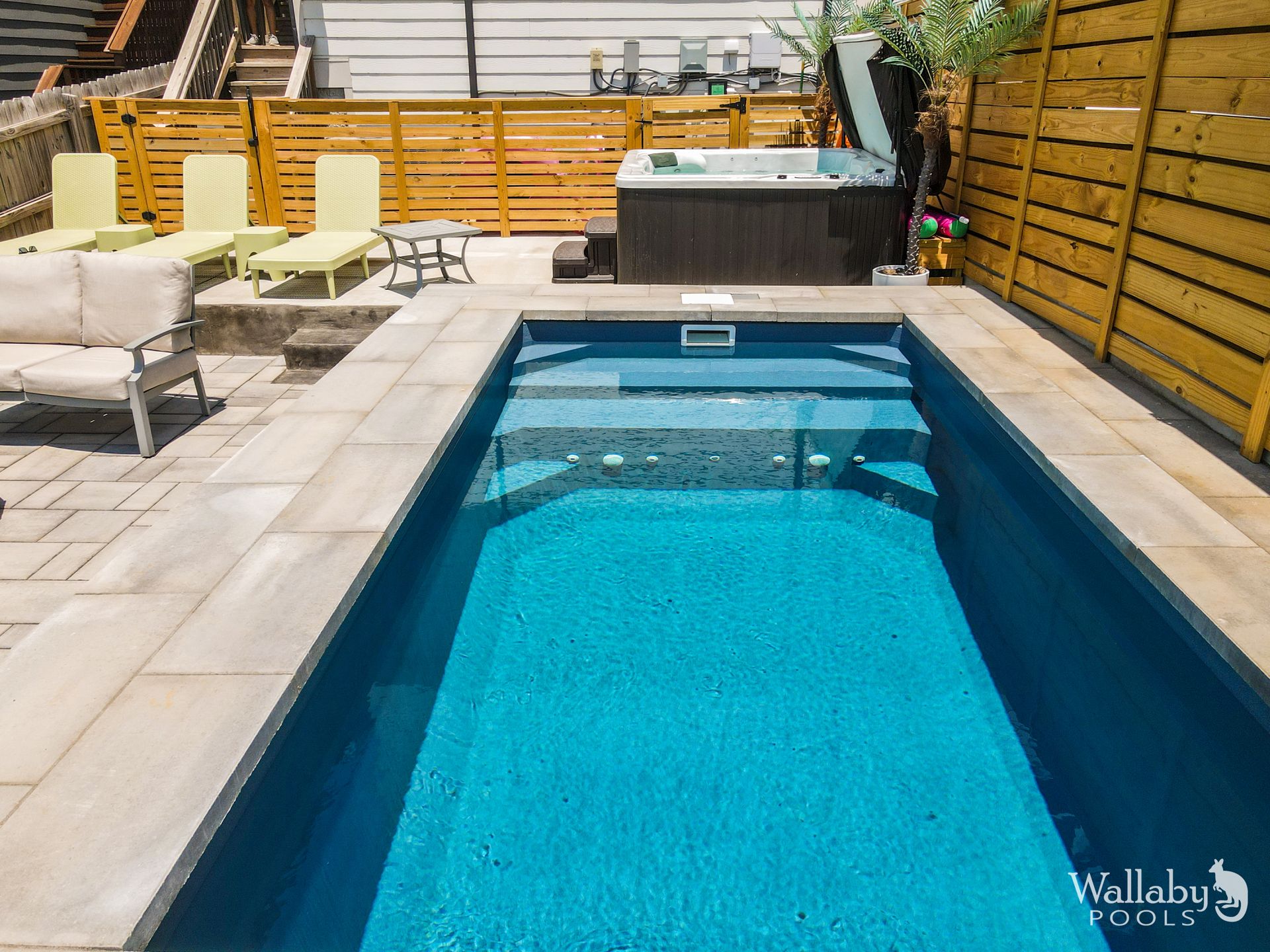 Concrete plunge pool with lounge deck